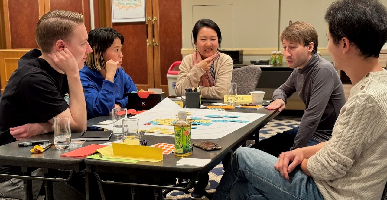 A large workshop in progress — a group of ten working on their own projects